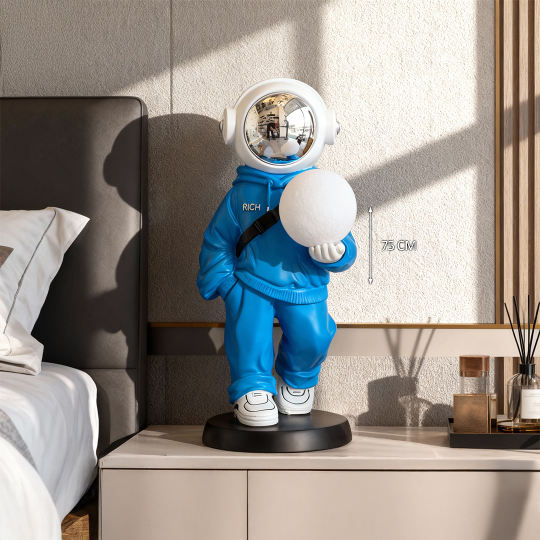 astronaut floor sculpture with an LED ball