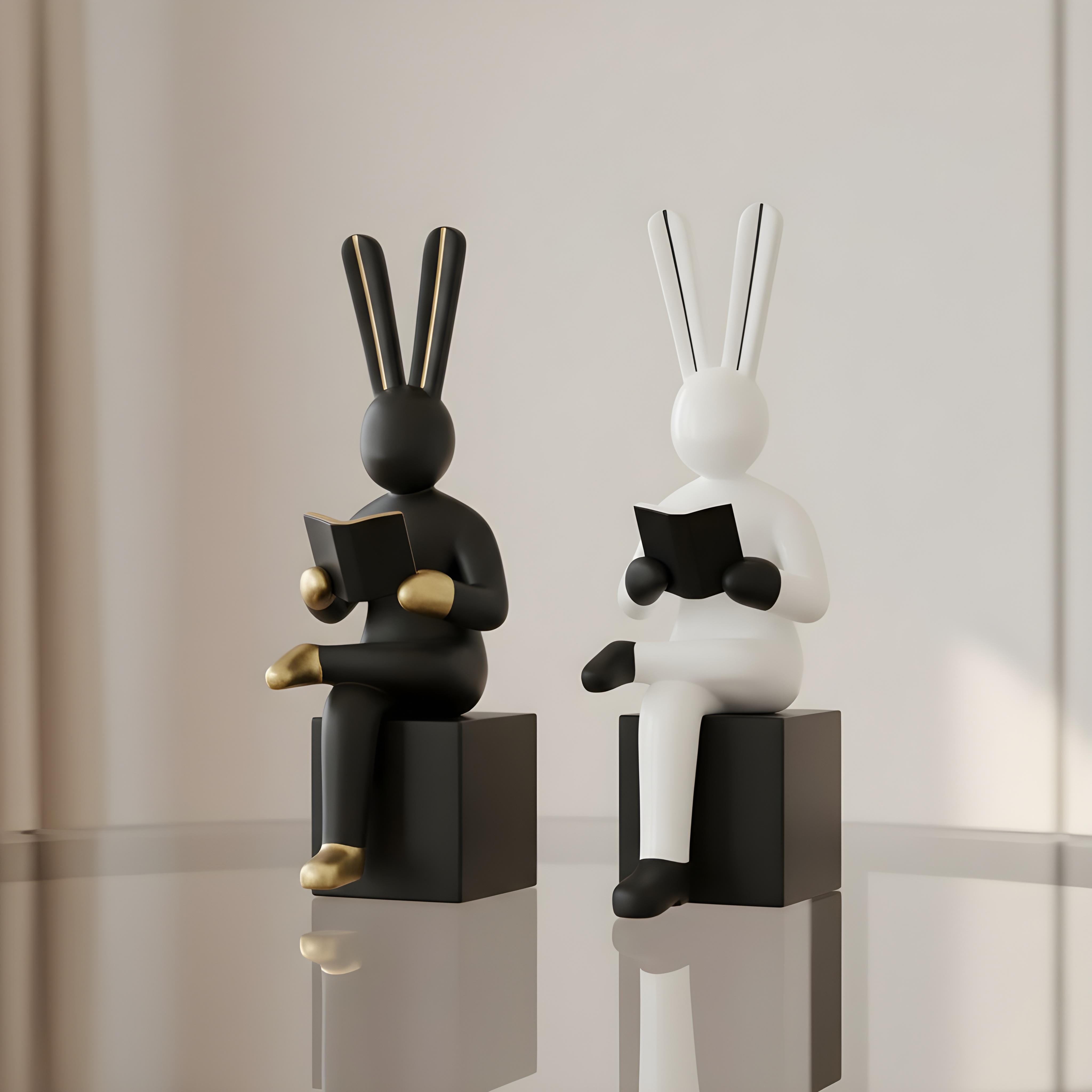 anime-inspired black and white ceramic rabbit figurines