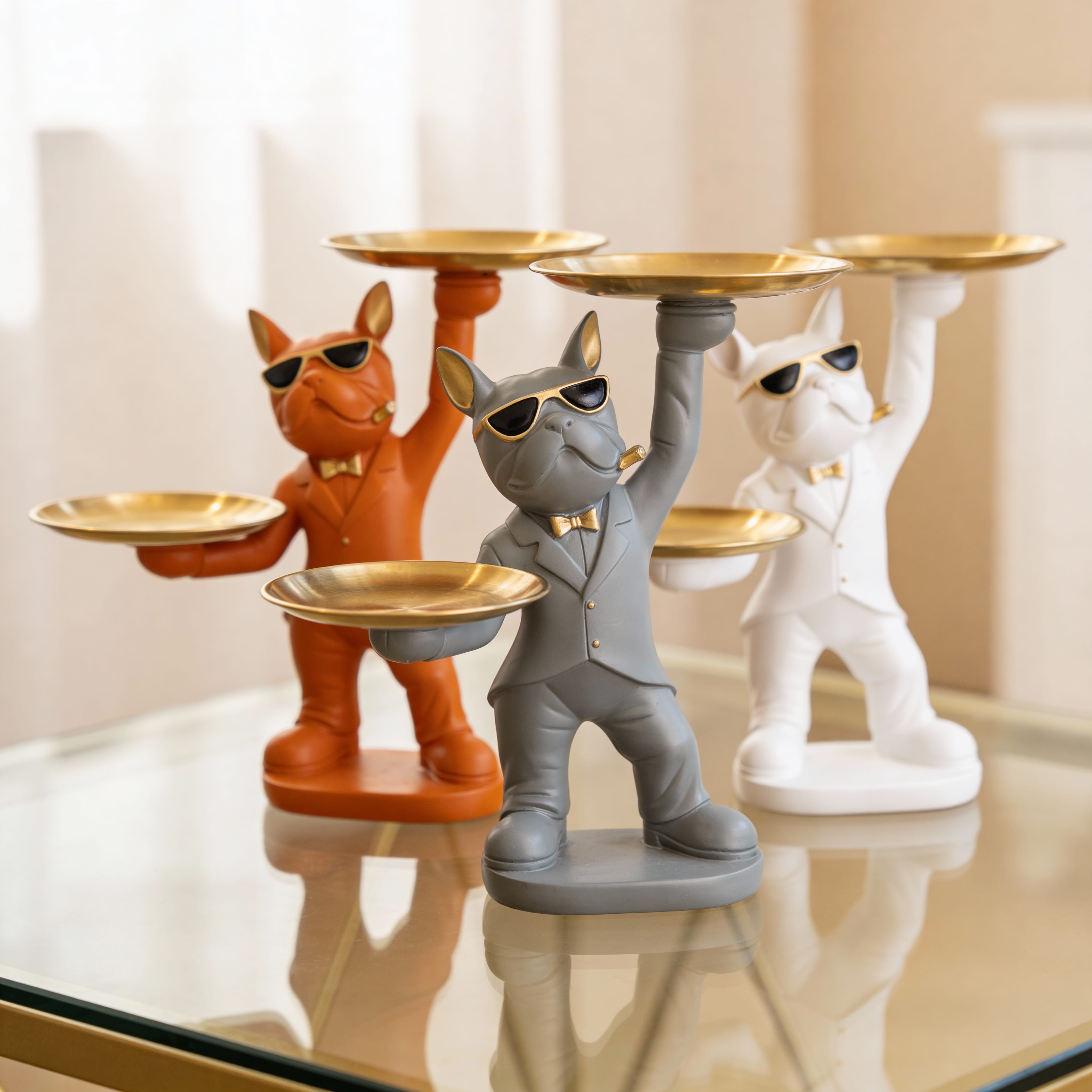 resin French Bulldog butler sculptures with trays. 
