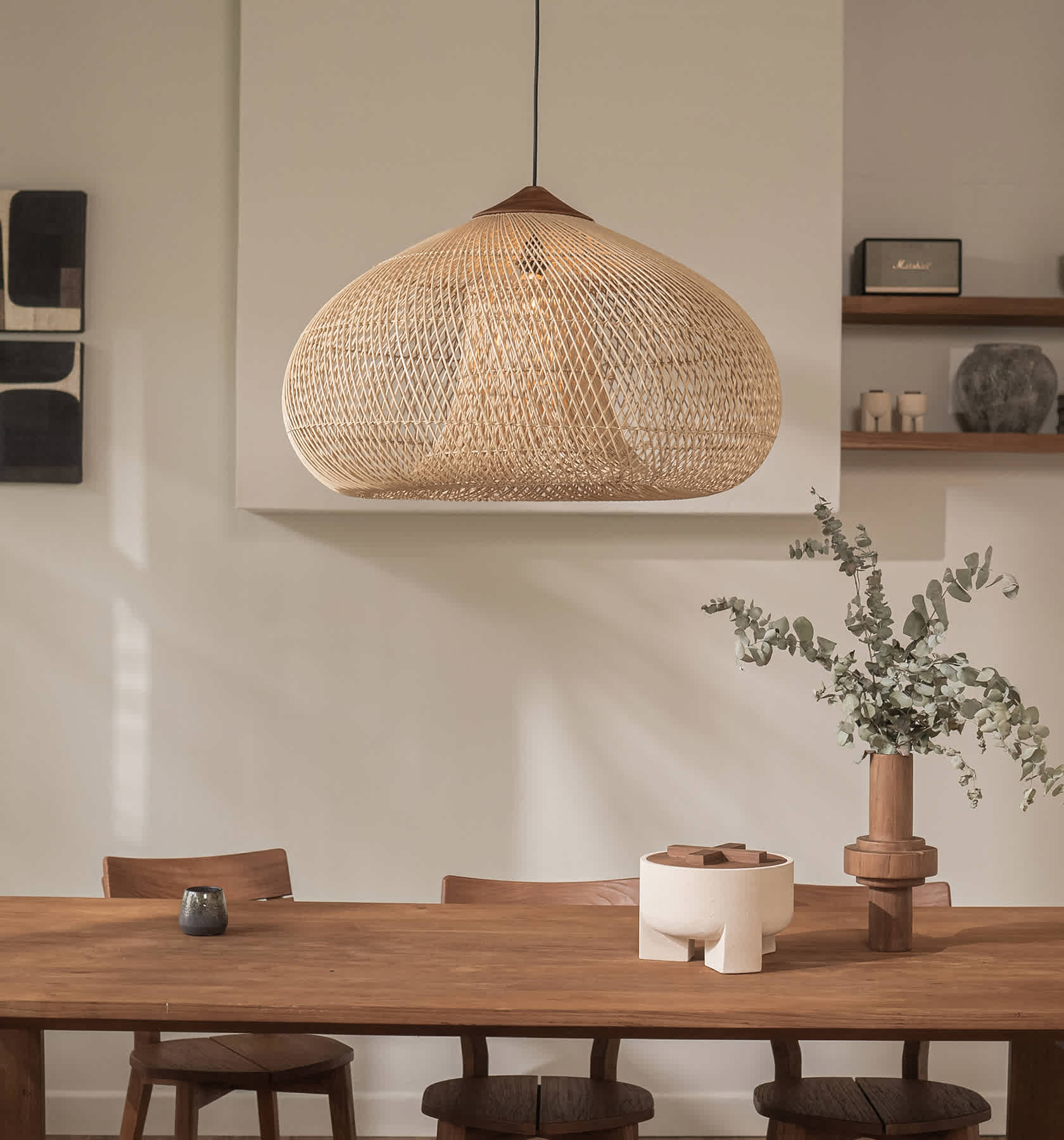 Drum Lamp made from woven natural rattan and teak wood.