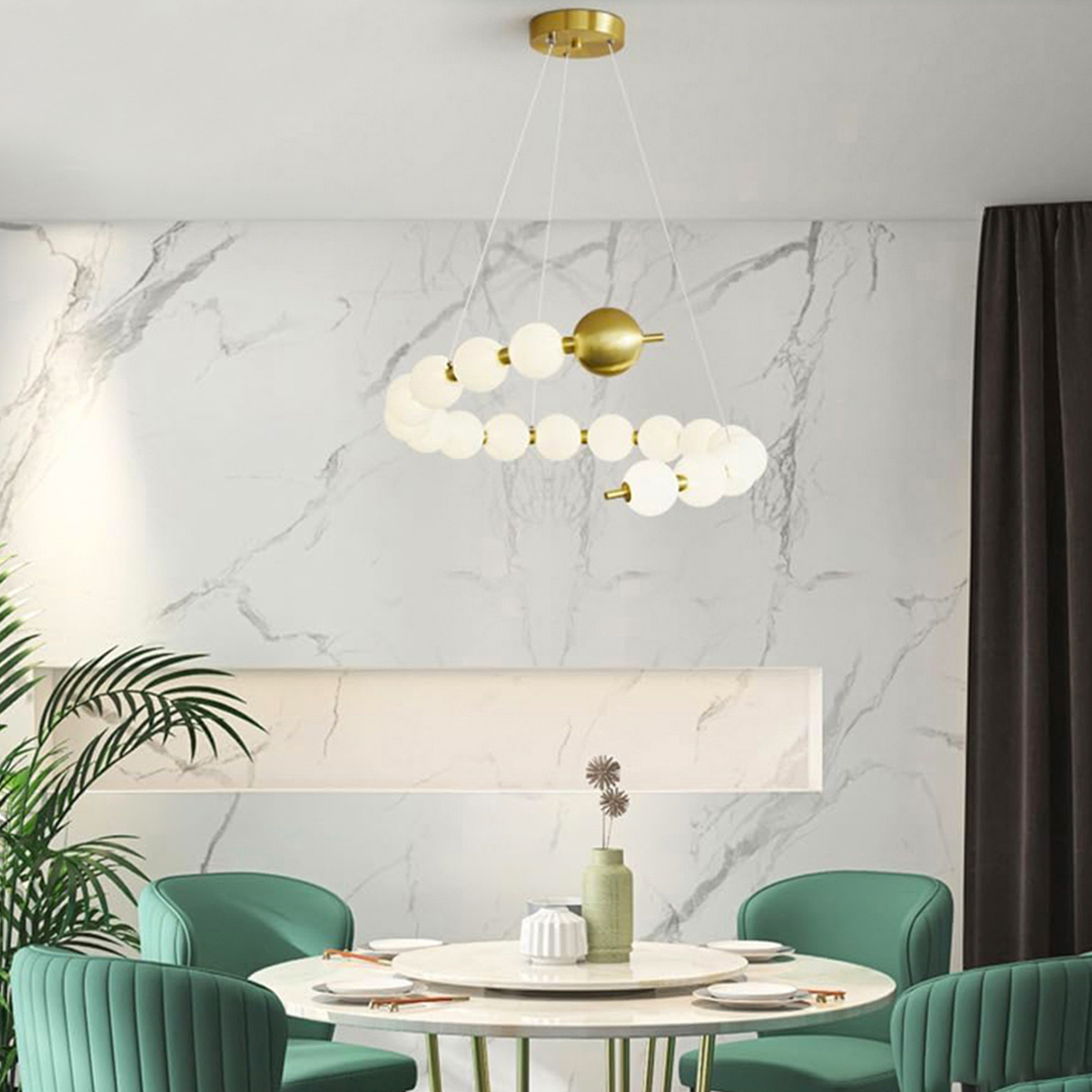 ring-shaped chandelier with frosted glass globes and a gold finish