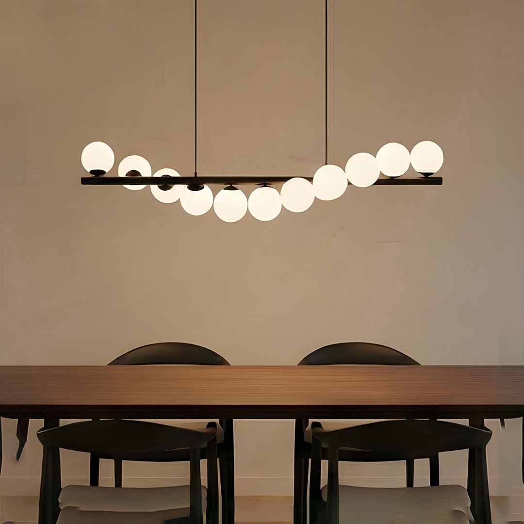 Lucande Isandro 7-bulb pendant light featuring aframe and opal glass shades.