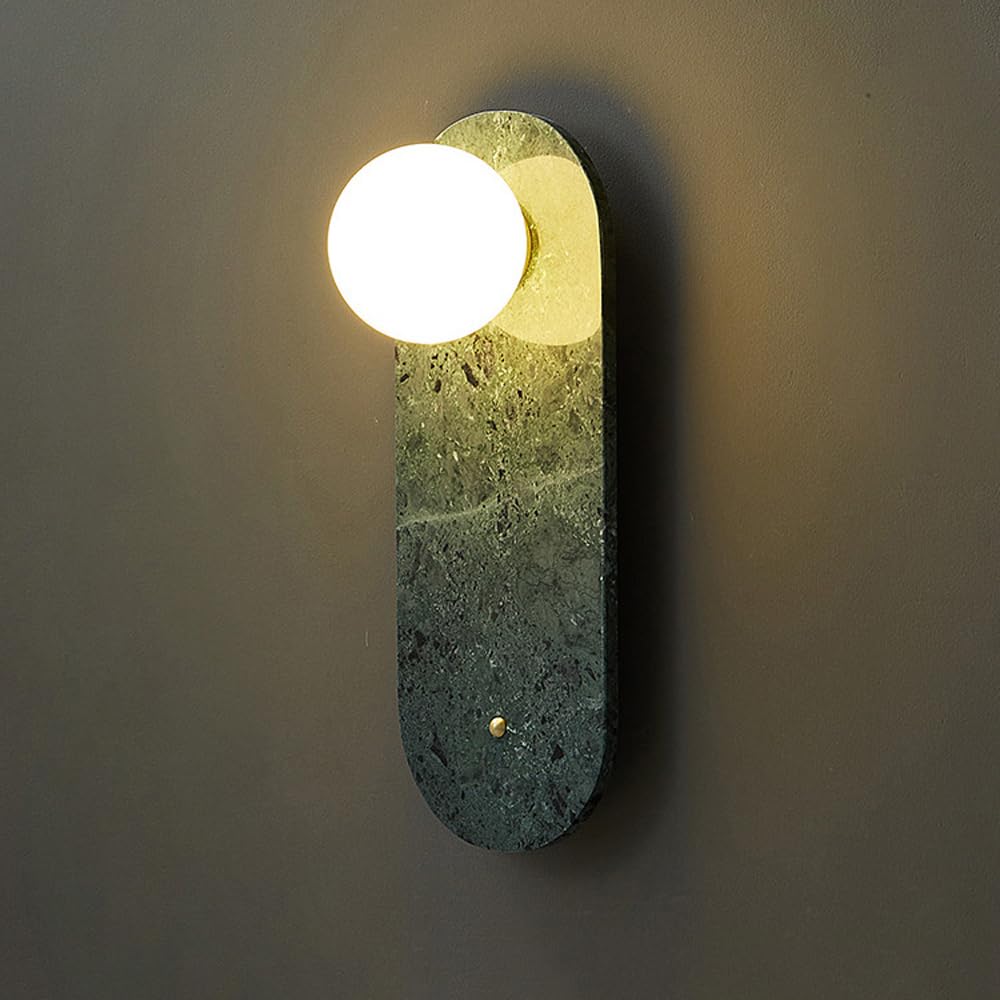 Alternative view of marble-patterned wall sconce, likely similar to the Lucie Oval Wall Lamp, featuring a unique natural stone texture and soft ambient lighting. 