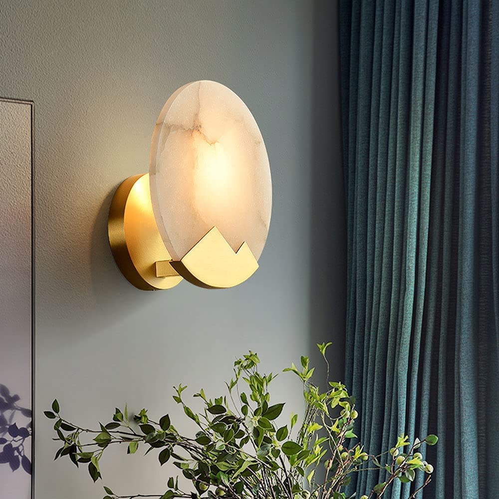 Alternative view of brass wall light features a round marble shade, often found listed as the "Contemporary Brass Wall Light with Round Marble Shade