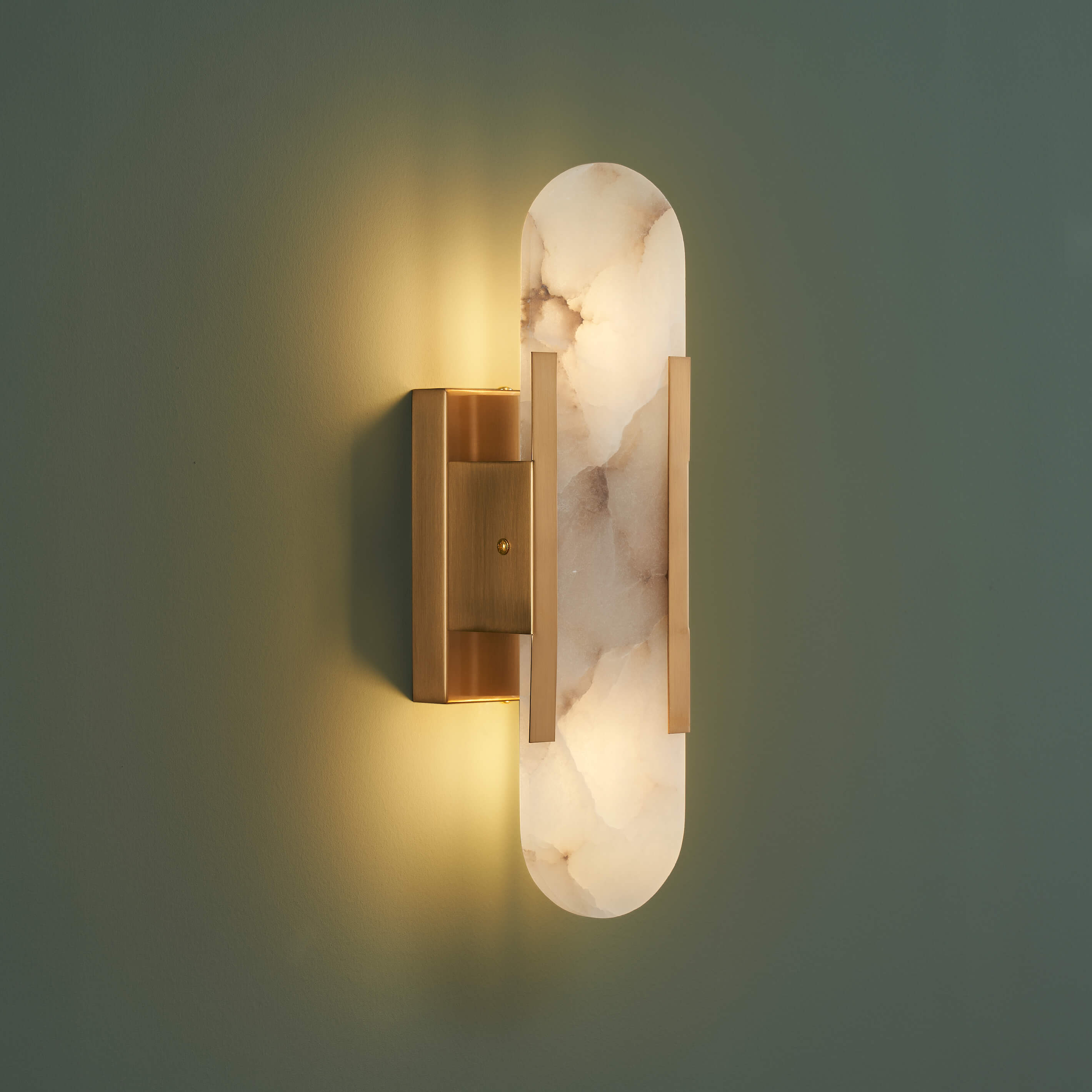 Alternative view of Ymiko contemporary marble wall sconce lamp featuring a golden base and frosted marble finish. 