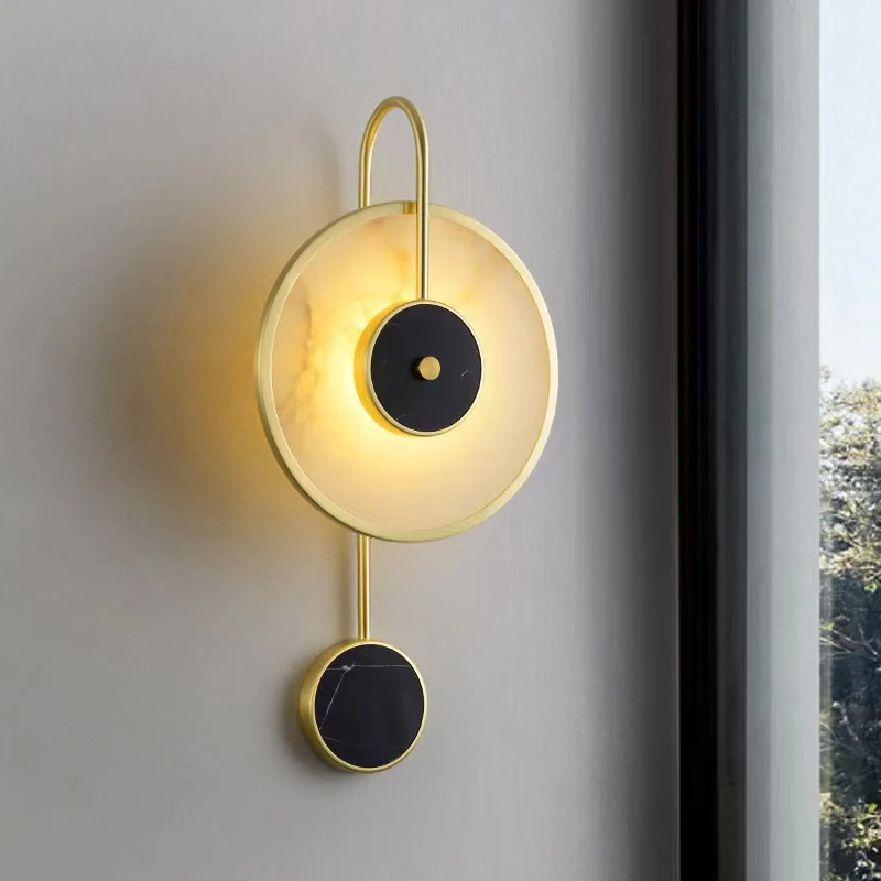 Alternative view of sconce is the SamuLighting Alabaster Kandy Wall Lamp, featuring a design crafted from marble, brushed brass