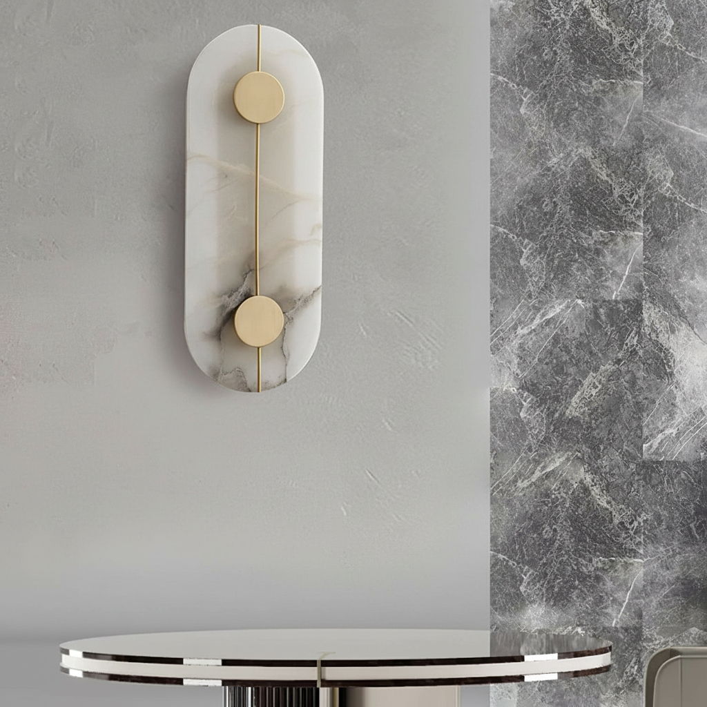 sconce crafted from natural marble with integrated LED lighting and brass accents