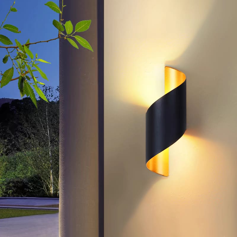 Alternative view of spiral wall light fixture, commonly known as a "Hilde" model or similar "Up Down" sconce .