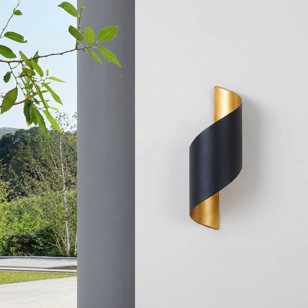 spiral wall light fixture, commonly known as a "Hilde" model or similar "Up Down" sconce .