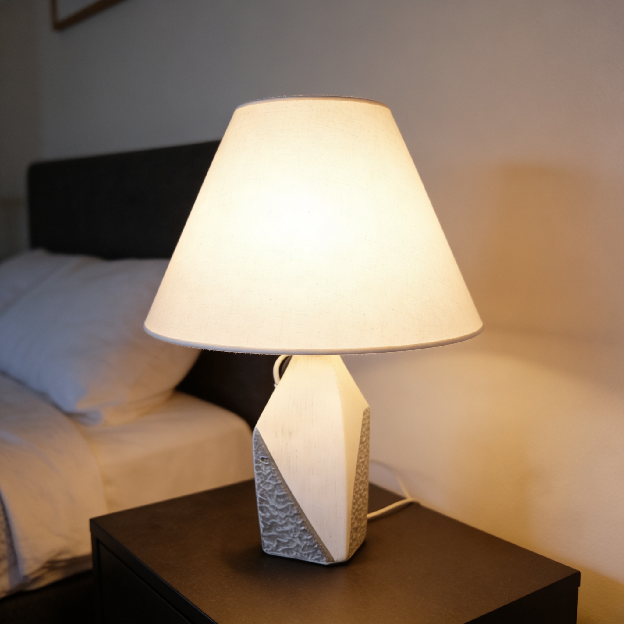 Alternative view of Sheppard Studio Warp Lamp featuring a textured ceramic base and a linen shade. 